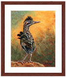 Pastel painting print of a greater roadrunner with a mahogany frame and white mat. Rendered in a contemporary style using bold strokes and bright colors by award winning artist Kathie Miller. 