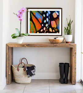  Monarch Butterfly wing abstract painting hanging in an entrance hall by wildlife artist Kathie Miller.