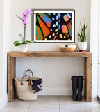  Monarch Butterfly wing abstract painting hanging in an entrance hall by wildlife artist Kathie Miller.