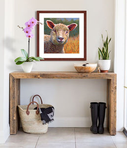 Pastel painting of a lamb in the sun in entrance hall .  Rendered in a contemporary style using bold strokes and bright colors by award winning artist Kathie Miller.